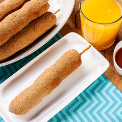 .Breaded and fried chicken skewer. Typical Brazilian snack. Top view