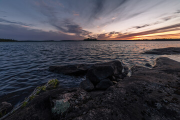 Sunset from a rocky island on a remote lake in Northwest Ontario, Canada.