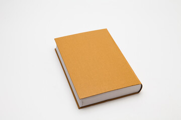 Gold color blank book on white background 