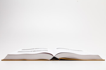 Open book on white background