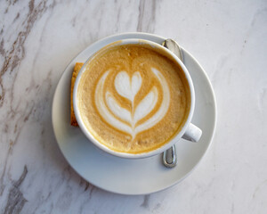 Italian cappuccino coffee cup on marble table surface