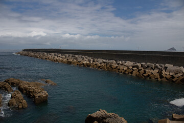 Dock with cube shaped rocks