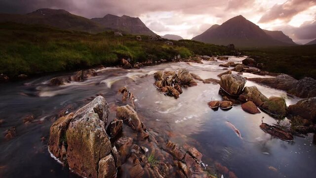 time lapse footage of the river coupall as it flows towards the valley of glencoe in the argyll region of the highlands of scotland in summer