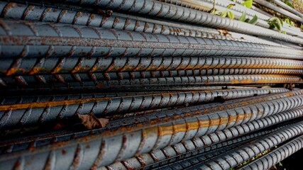 A stack of circular threaded iron profiles for buildings