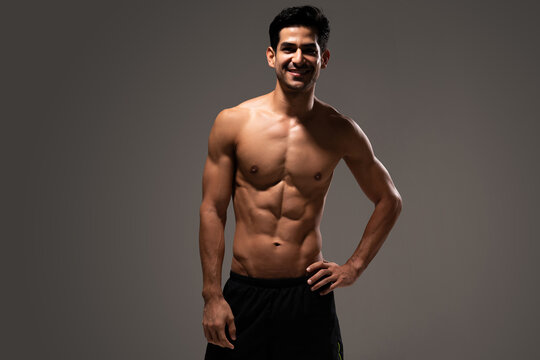 Smiling Handsome Athletic Man With Ripped Abs