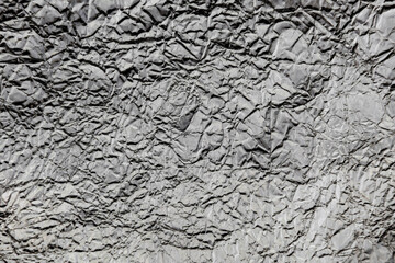 Crumpled wrinkled silver foil texture