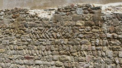 Antike Mauer mit verschiedenen Strukturen, Alte Mauer für Baufirmen, Bauarbeiten an Mauern, Mauerstruktur für Architektur