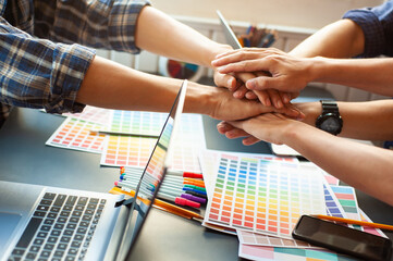 The cooperation of the design team for successful work.