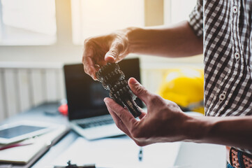 The engineer assembled the internal gear model of the engine.