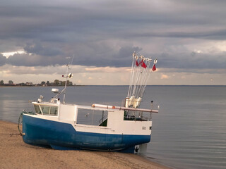 Fishing boat on a Baltic Sea coast in Mechelinki, Poland.