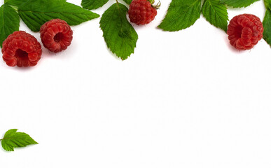 Ripe raspberries isolated on white background close-up. Beautiful red fresh raspberries with leaves along the contour on the table. Top view. Banner for the site. Free space for text