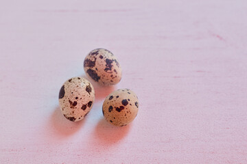 Quail eggs on a white background