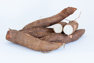 Fresh Cassava root isolated on a white background. Space copy.