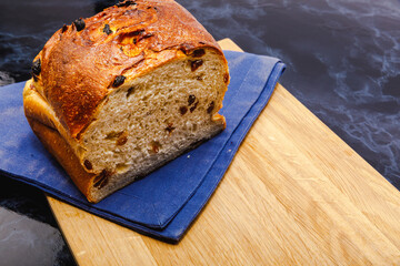 loaf of bread on a wooden board