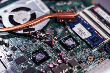 Computer circuit board. Computer repair shop. High technology. Motherboard. Laptop motherboard. Cooler