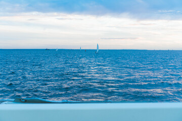 Fototapeta premium sailboats at sunset at sea