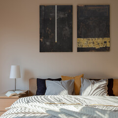 Morning in stylish bedroom with art