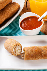 .Breaded and fried chicken skewer. Typical Brazilian snack.