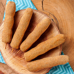 .Breaded and fried chicken skewer. Typical Brazilian snack. Top view