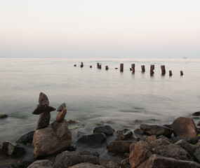 sunset on the beach,rocks,rest,imbalance,balance,sea,evening,seascape,nature,horizon,water,stones
