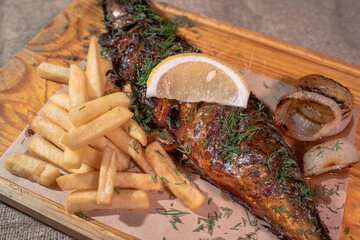 Delicious freshly baked mackerel in josper