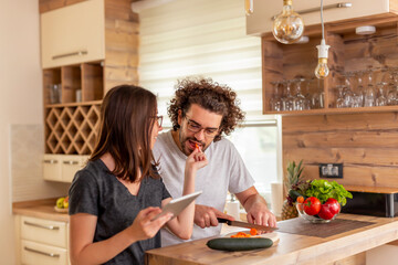 Couple preparing a meal together