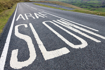 Slow sign road markings