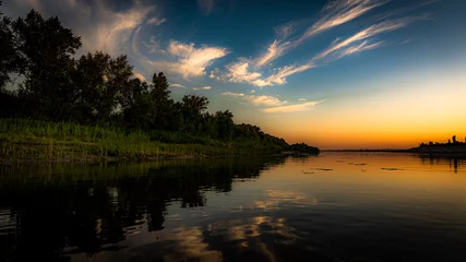 Foto op Canvas  Beautiful July sunset on the Lower Volga near the city of Volgograd, Russia © Алексей Басов