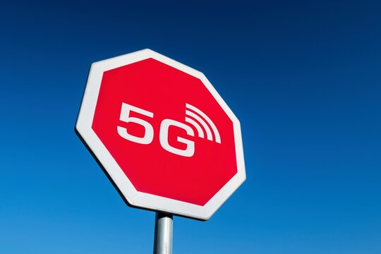 Stop sign dealing with radiation from 5G radio waves which are believed to be harmful by conspiracy theories claiming it causes fertility issues and spread of COVID-19