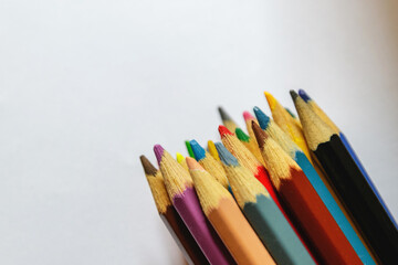 Colored pencils on a light background