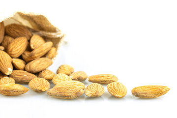 Close up of almond seeds isolate on whtite background.
