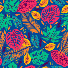 Seamless pattern with tropical leaves on a blue background. Vector graphics.