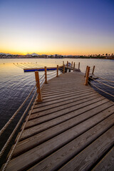 Naklejka na ściany i meble Wooden Pier on Red Sea in Hurghada at sunset, Egypt - travel destination in Africa