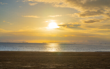 Sunrise sea beach sky landscape. Beautiful sun light reflection.