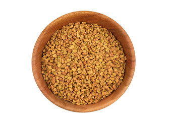 Fenugreek Seed (Methi Dana) Culinary Herb Spice in a Bowl. Isolated on White Background.