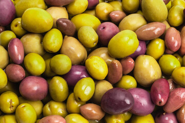 Tasty mix olives background.
