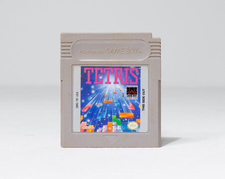 london, england, 05/05/2018 A nintendo gameboy original tetris video games cartridge and plastic case. 1990s famous iconic game boy portable classic video gaming on the move. Grey nintendo cart.