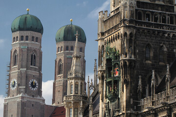 Both onion domes of the Gothic cathedral and city parish church known as the Frauenkirche, Dom zu unserer Lieben Frau, Cathedral of Our Dear Lady, travel destination backgrounds at Munich Germany