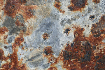 metal surface with rust and stains