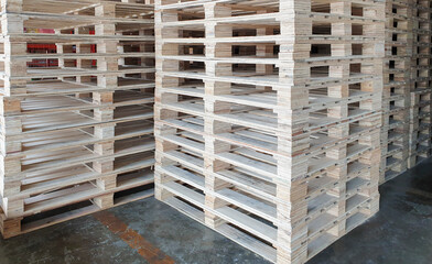 Stack of wooden pallets at industrial warehousing.