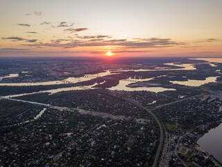 Sunset over the Dnieper River in Kiev. Aerial drone view.