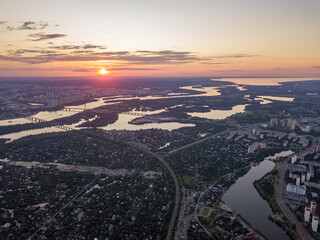 Sunset over the Dnieper River in Kiev. Aerial drone view.