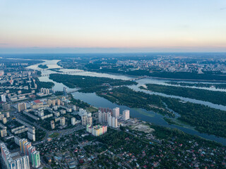 Obraz premium Sunset over the Dnieper River in Kiev. Aerial drone view.