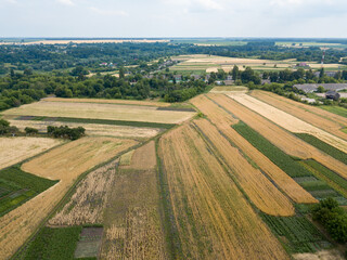 Agricultural fields in the Ukrainian village. Aerial drone view.