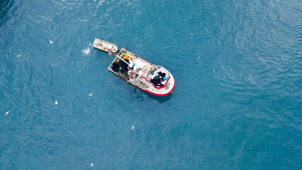 aerial view of the fishing boat at the sea