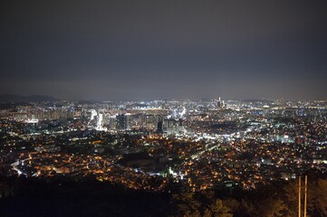 Beautiful scenery of an illuminated cityscape at night in Namsan, Seoul