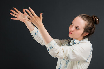 Very nice girl violently gesticulating with her hands