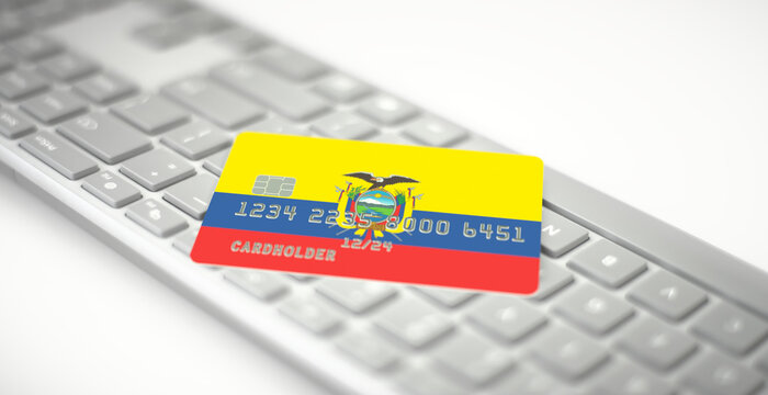 Credit card depicting flag of Ecuador on computer keyboard. Fictional numbers