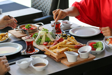 couple having breakfast at restaurant in the morning