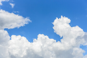 Naklejka na ściany i meble White cloud disappear in the hot sun on blue sky